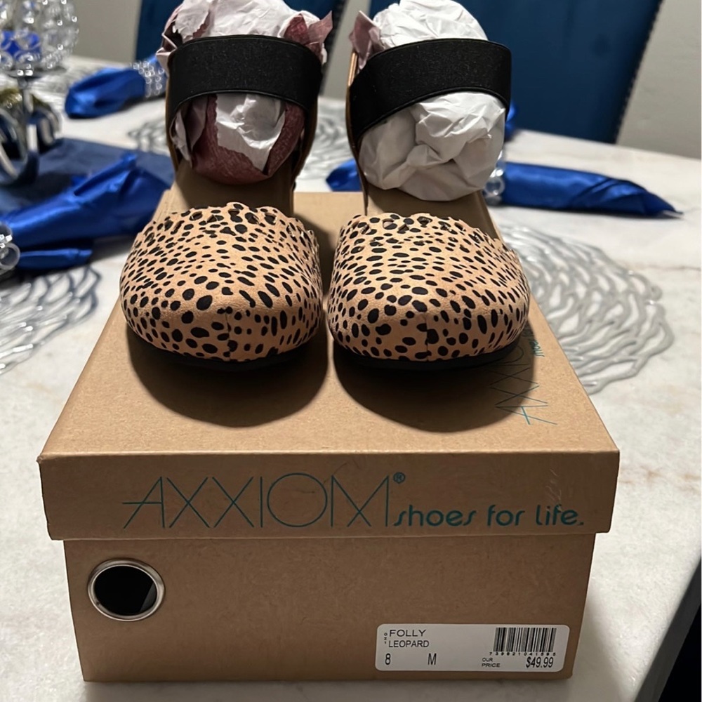 Axxiom Leopard print wedges shoes.